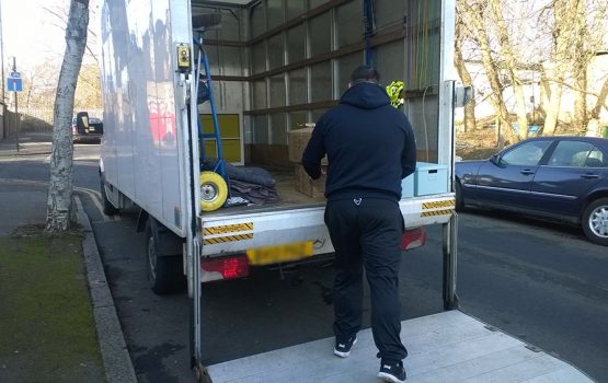 A mover loading his van